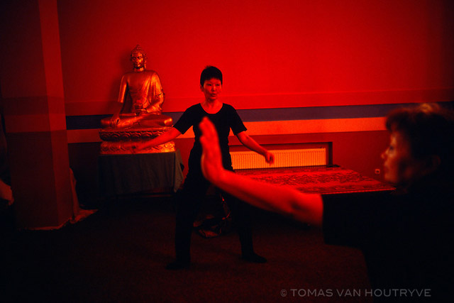 Women participate in a yoga class inside the main Buddhist temple in Elista